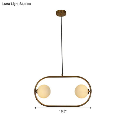 Modern gold globe hanging chandelier with frosted glass – bedroom