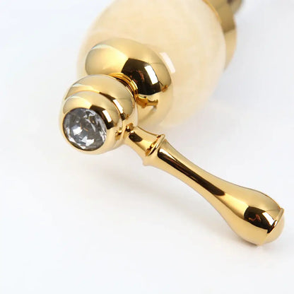 golden plated waterfall bathtub faucet with marble handles