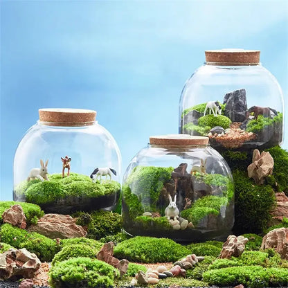 Green moss glass vase terrarium with rabbit figurines living room decor