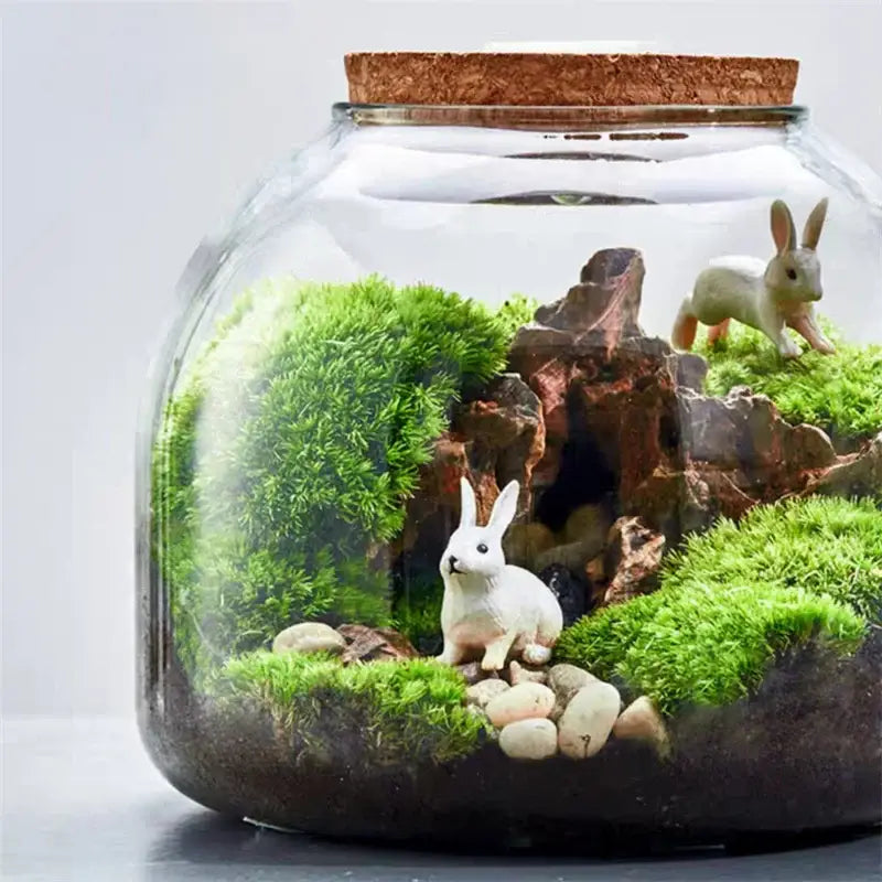 Green moss glass vase terrarium with rabbit figurines living room decor
