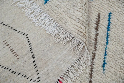 Handmade beige geometric azilal rug – bedroom natural wool decor