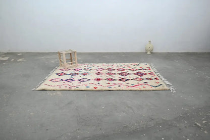 Handmade traditional azilal rug beige and pink bedroom decor