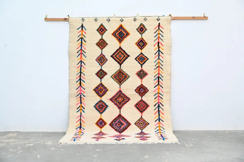 Handmade moroccan azilal rug beige vibrant colors living room decor