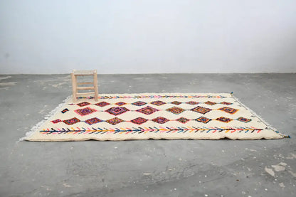 Handmade moroccan azilal rug beige vibrant colors living room decor