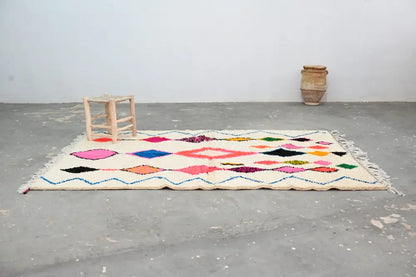 Handmade moroccan azilal rug with vibrant colors for living room