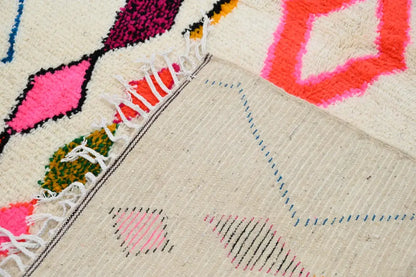 Handmade moroccan azilal rug with vibrant colors for living room