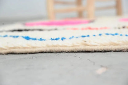 Handmade moroccan azilal rug with vibrant colors for living room