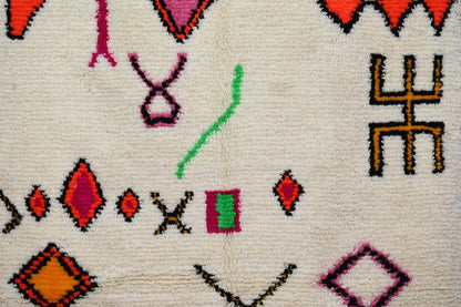 Handmade moroccan azilal rug beige and red living room decor