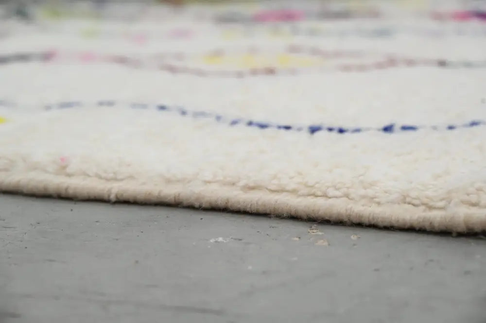 Handmade beige moroccan azilal rug with colorful diamonds living room