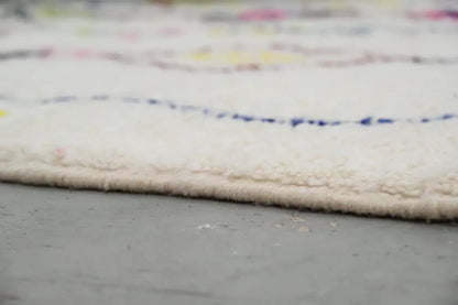 Handmade beige moroccan azilal rug with colorful diamonds living room