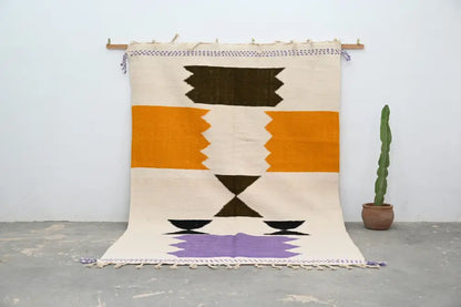 Handmade moroccan azilal beige and orange rug bedroom decor