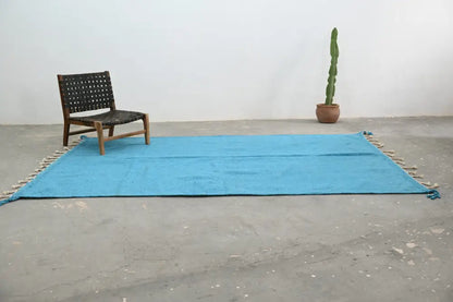 Handmade traditional azilal rug turquoise living room decor with tassels