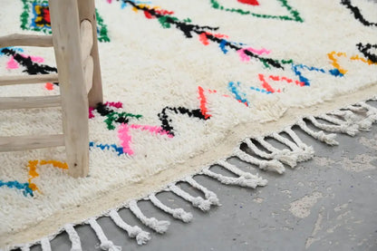 Traditional beige azilal rug with colorful patterns for living room