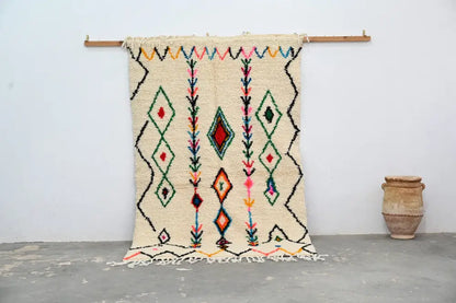 Traditional beige azilal rug with colorful patterns for living room