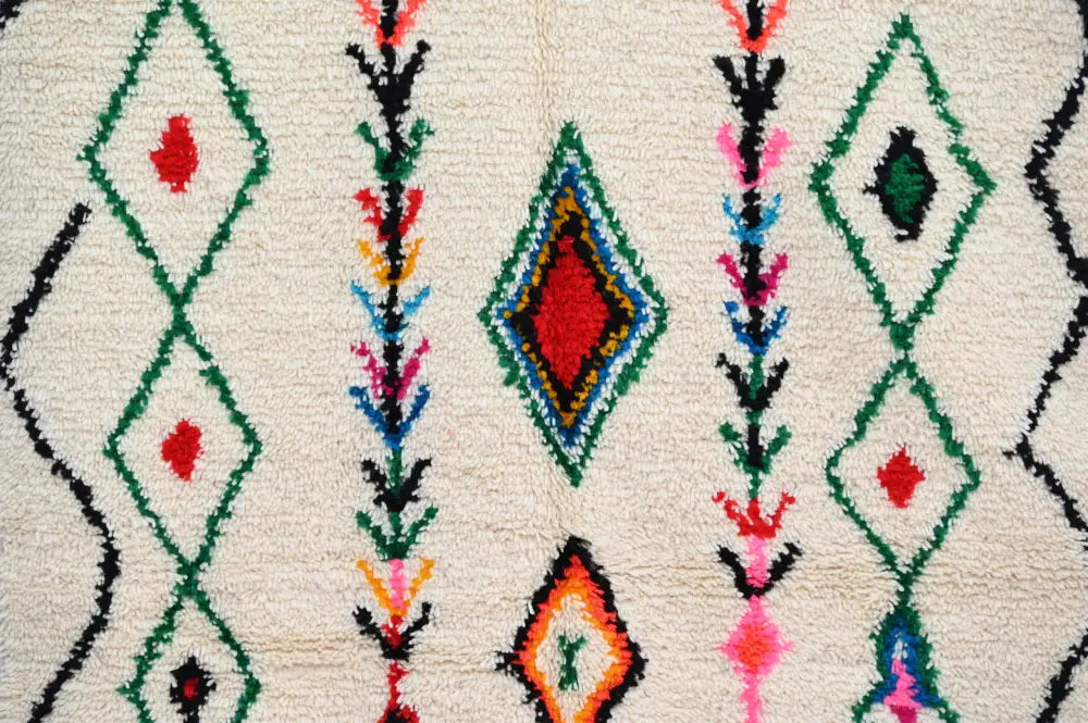 Traditional beige azilal rug with colorful patterns for living room