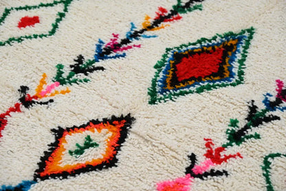Traditional beige azilal rug with colorful patterns for living room