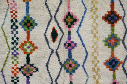 Traditional beige azilal rug with geometric patterns for living room