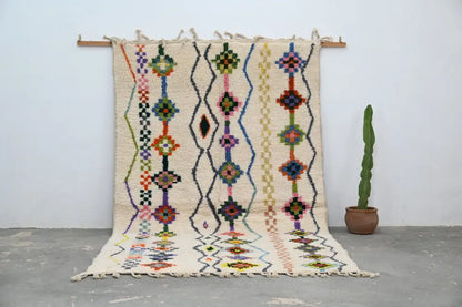 Traditional beige azilal rug with geometric patterns for living room