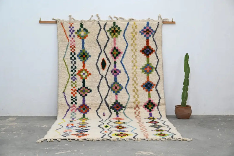 Traditional beige azilal rug with geometric patterns for living room
