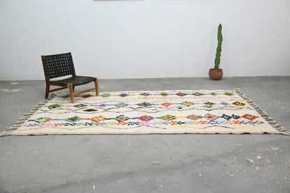 Traditional beige azilal rug with geometric patterns for living room