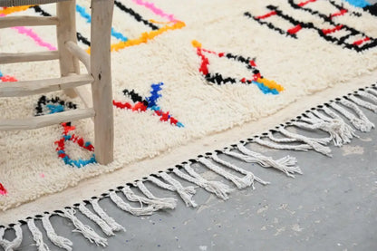 Handwoven moroccan azilal rug beige geometric bedroom decor