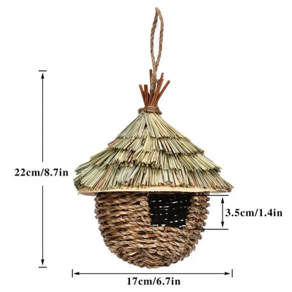 Handwoven straw bird nest with hanging rope for garden decor