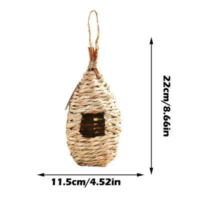 Handwoven straw bird nest with hanging rope for garden decor