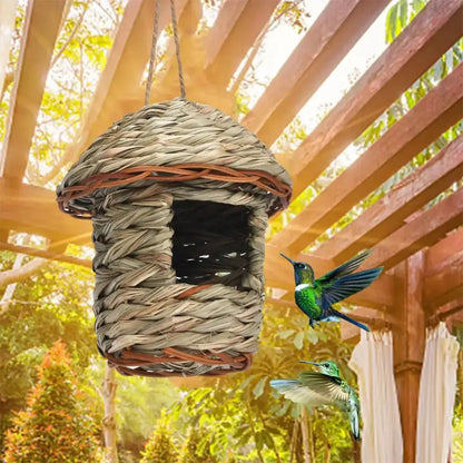 Handwoven straw bird nest with hanging rope for garden decor