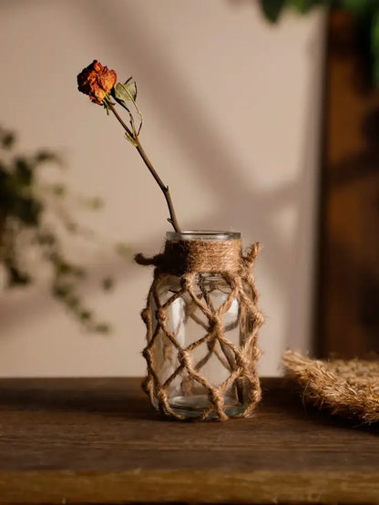 Rustic hanging glass vase with hemp rope twine netting – living room