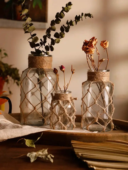 Rustic hanging glass vase with hemp rope twine netting – living room
