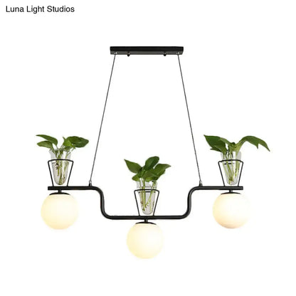 Industrial black kitchen island light with opal glass and clear glass pot