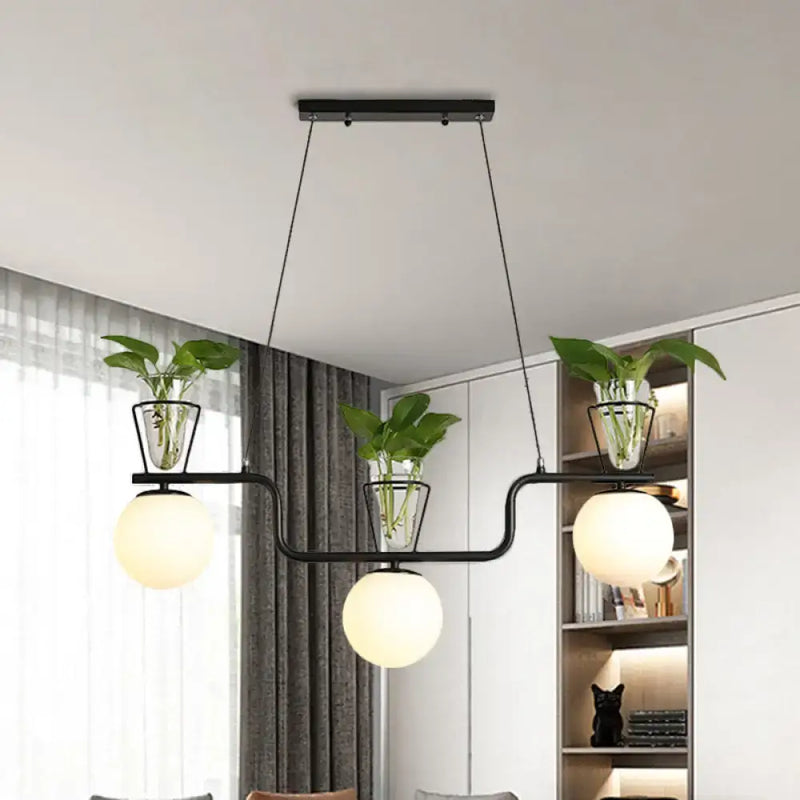 Industrial black kitchen island light with opal glass and clear glass pot