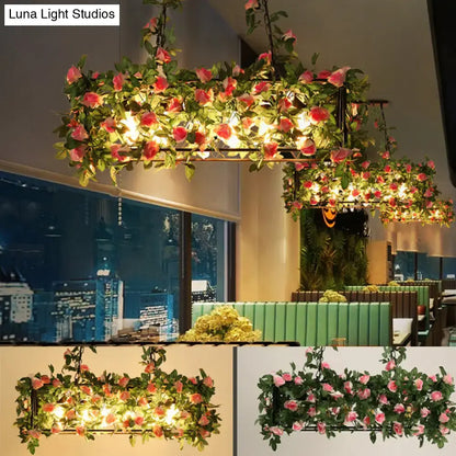 Rustic industrial cage island light with pink flowers dining room
