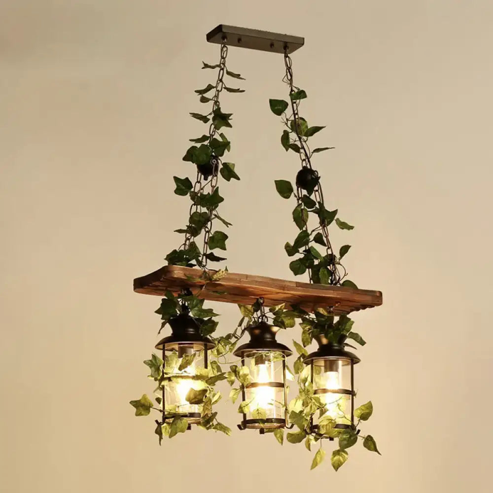 Rustic industrial cage island light with pink flowers dining room