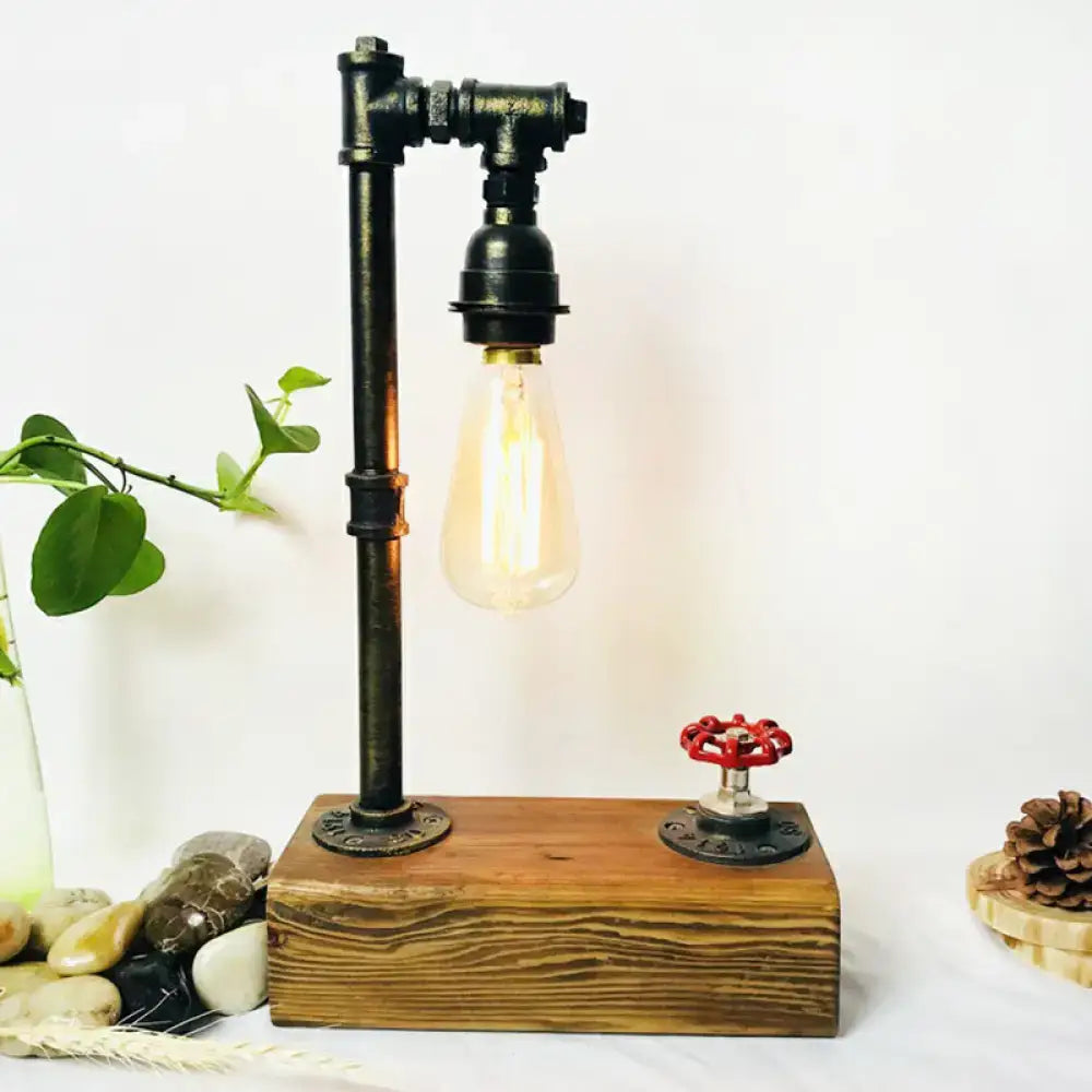 Industrial bronze finish pipe table lamp with wooden base bedroom