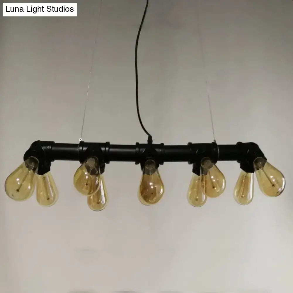 Industrial black pipe light fixture – dining room amber glass lamp