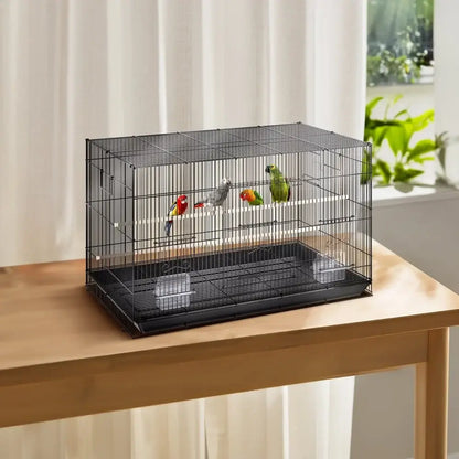 Large black metal bird cage with perches for living room