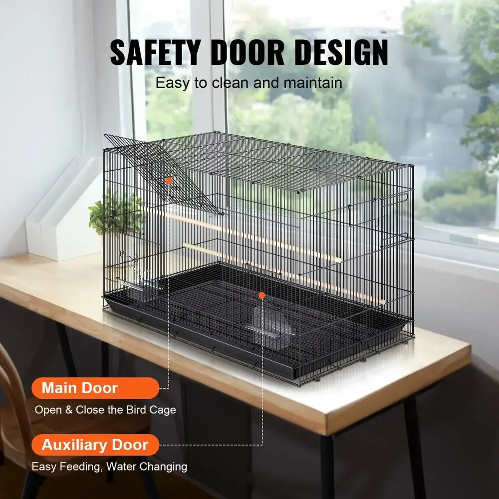 Large black metal bird cage with perches for living room