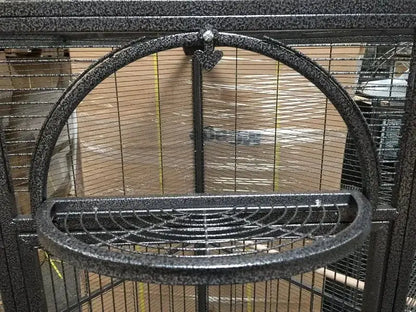 Silver wrought iron arched flight bird cage living room rolling base