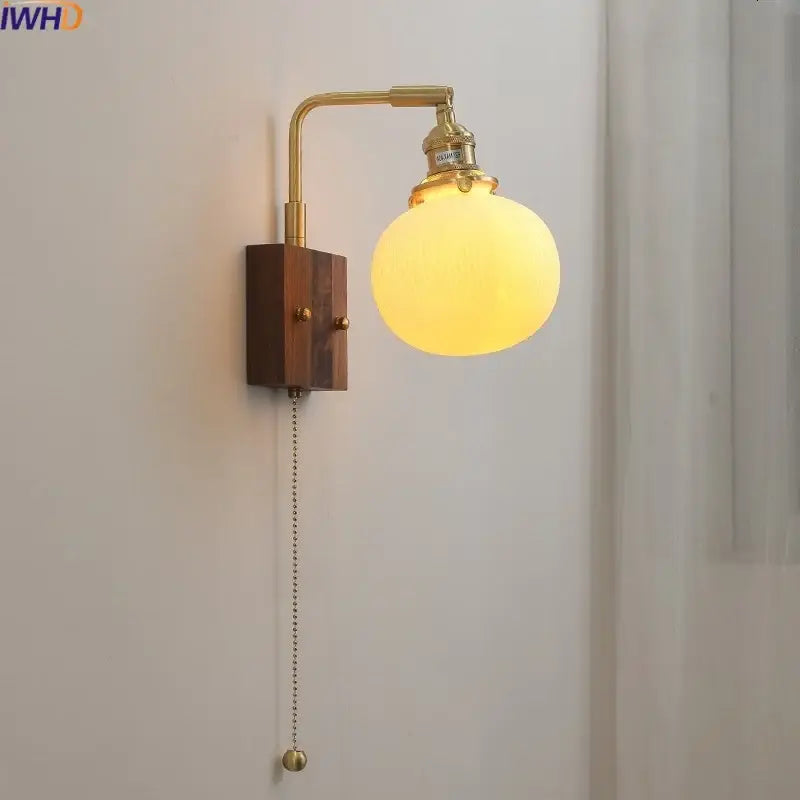 Brass and wood globe wall sconce bedroom light fixture