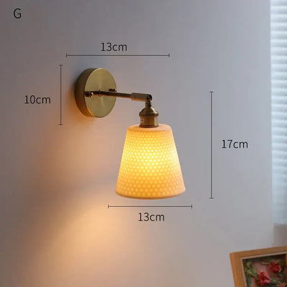 Ribbed white glass and brass ceramic wall sconce for bedroom lighting