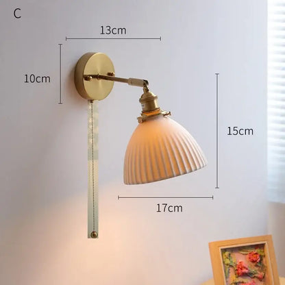 Ribbed white glass and brass ceramic wall sconce for bedroom lighting