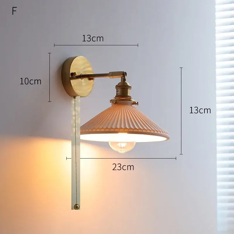 Ribbed white glass and brass ceramic wall sconce for bedroom lighting