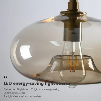 Modern brass and amber glass ceiling light for living room