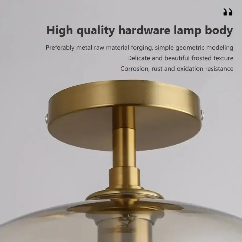 Modern brass and amber glass ceiling light for living room