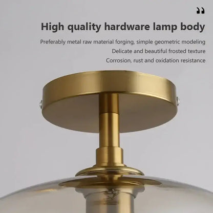 Modern brass and amber glass ceiling light for living room