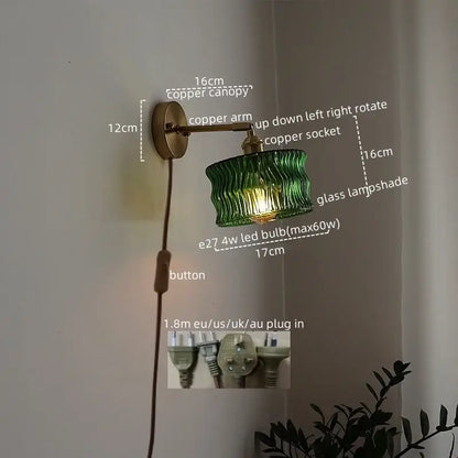 Green ribbed glass wall sconce with pull chain switch for bedroom