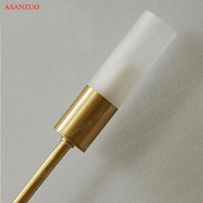 Minimalist gold candlestick wall light with frosted glass for bedroom