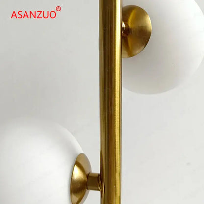 Modern gold 3 globe table lamp with milk white glass for bedroom