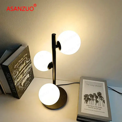Modern gold 3 globe table lamp with milk white glass for bedroom